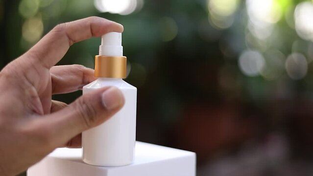 Close-up of a hand-operated spray nozzle. Clean using spray solution. Cleaning, protection concept, antivirus, bactericidal spray