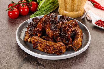 Grilled pork ribs in barbecue sauce