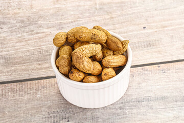 Raw ripe unpeeled peanut heap