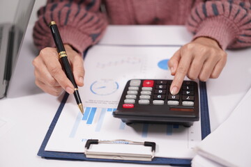 Two beautiful Asian employees enjoying successful work and confidently holding hands to work productively together at the office. Businessman, employee, African, laptop.