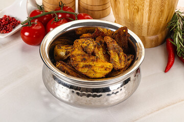 Golden baked potato Idaho with spices
