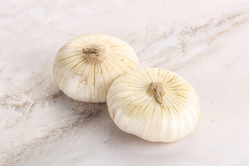 Raw white onion heap isolated