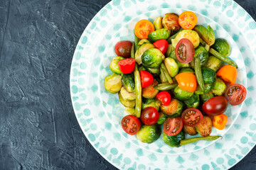 Vegetable salad with fried Brussels sprouts.