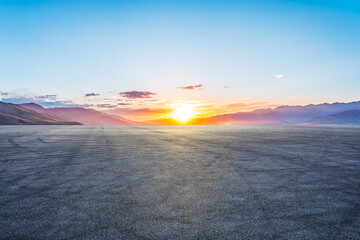 Asphalt road square and mountain with sky clouds at sunset