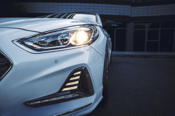 Closeup headlights of new sport car
