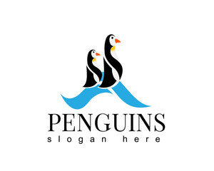 Obraz premium penguins logo design template two pinguns walking together