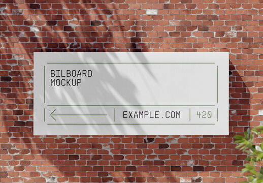 Billbooard on Brick Wall Mockup