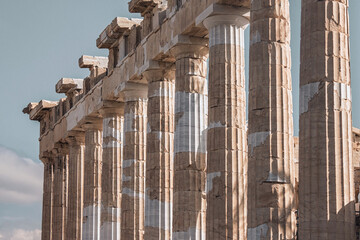 Colonnade of Parthenon temple on the Acropolis hill. Close up fragment, toning. Athens, Greece
