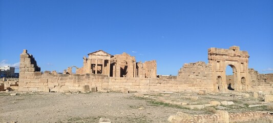 Fototapeta premium The Capitol Temples (Capitolium), Roman ruins of Sbeitla (Sufetula), Tunisia, North Africa 2024