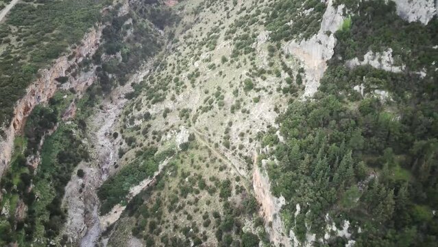 High drone footage of Velitsa Gorge near Tithorea Village at sunset in Phthiotis, Greece