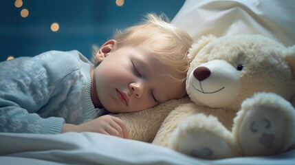 Obraz na płótnie Canvas A little boy with blonde hair sleeps on a bed with a soft toy bear in her arms. A child's sweet sleep