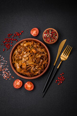 Delicious asian udon dish with vegetables, mushrooms, salt and spices