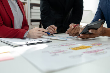 Financial accountant planner meeting business consultation introduction, Group of accountant persons talking in the office, businessperson's hand calculating invoice at workplace.