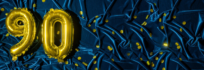 gold foil balloon number ninety. Birthday or anniversary card with the inscription 90. blue velvet...
