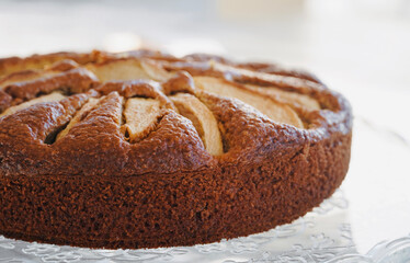 Homemade sliced fruit cake on white background. 