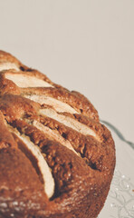 Homemade sliced fruit cake on white background. 