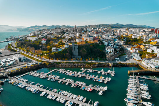 Ribadeo city and harbor with moored vessels. Northern Spain