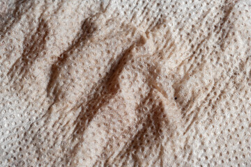 Paper texture. Wet toilet paper close-up. Dirty paper. Macro image.