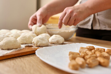 To make donuts, toffee is added to the dough. The process of making donuts