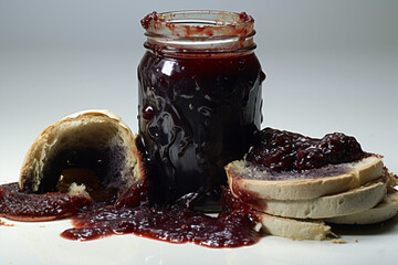 Spoiled jam with moldy pieces of bread - obrazy, fototapety, plakaty