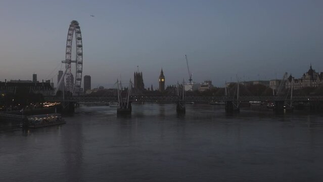 London Eye and Big Ben's Elizabeth Tower from Waterloo Bridge