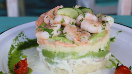 Causa rellena de langostinos, palta y papa, Causa stuffed with prawns, avocado and potato