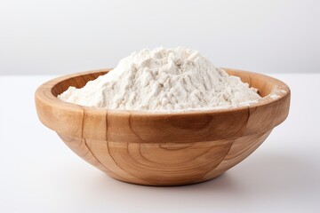 Fototapeta na wymiar Flour in wooden bowl on white background