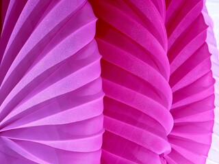 Silk pink purple chiffon tulle fabric textile background.