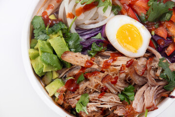 Pulled pork loaded ramen bowl dish