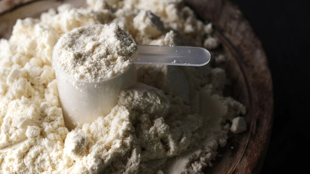 spoon with dry sport protein whey powder