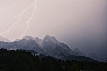 Dramatic lightning strike during a thunderstorm in the Steinberg in Leogang, Salzburg, Austria
