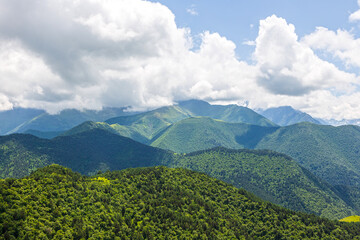 majestic Caucasus mountains drowning in clouds