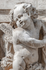 Venice, Italy. Beautiful angel child with wings as sacred medieval religious art