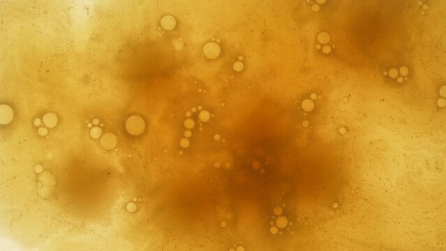 Fizzy tablet dissolving in water glass. Carbonated drink background