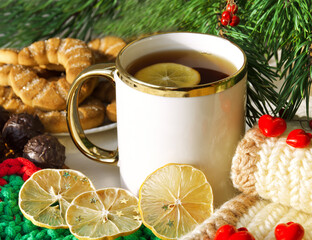 Beautiful mug with black tea and lemon for Valentine's Day.
