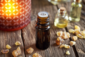 A bottle of frankincense essential oil with boswellia resin