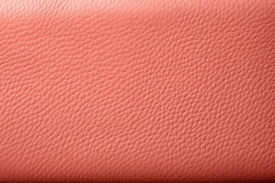  a close up of a pink leather textured surface with a black stripe on the bottom of the image and a black stripe on the bottom of the image.