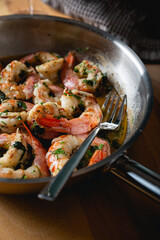 Fried langoustines, shrimp in white wine with garlic and parsley