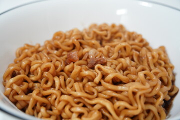 Jjajang Ramen is a popular Korean instant noodle that combines the flavors of Chinese-style black bean sauce  with Korean-style ramen. A representative K-food that appeared in the movie ‘Parasite’