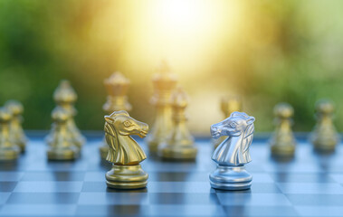 gold  knight Against whithe background, International chess, ideas and competition and strategy,...