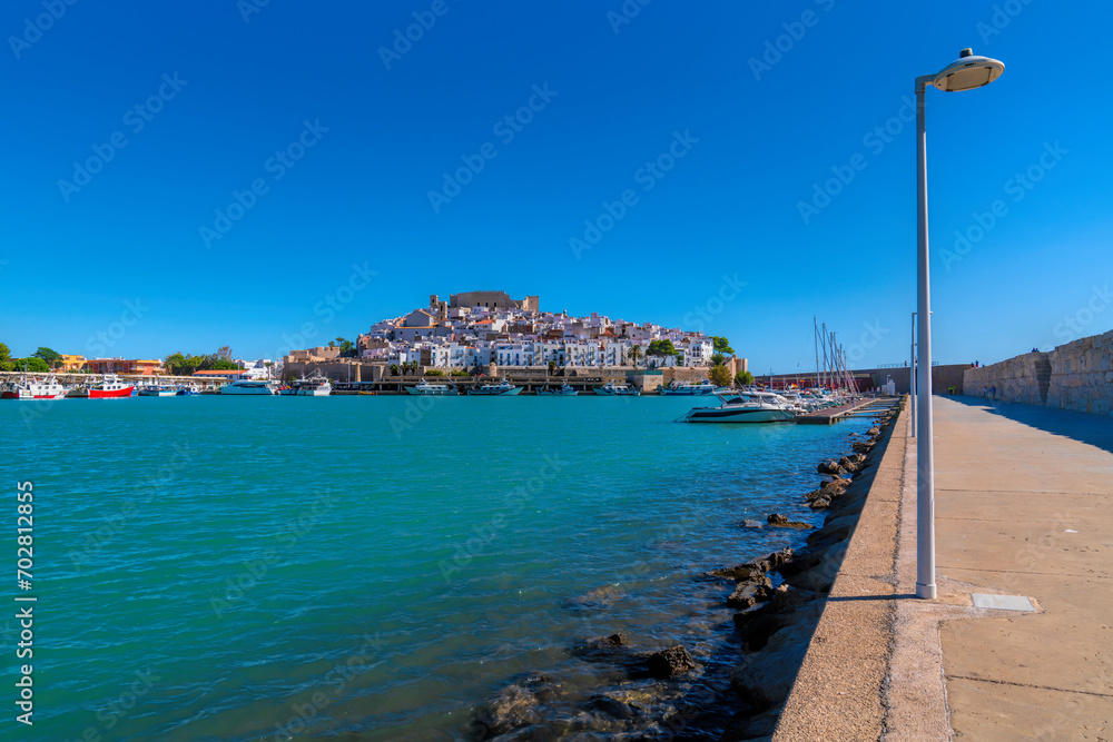 Wall mural Peniscola Spain port and castle with blue mediterranean sea Castellon province Costa del Azahar