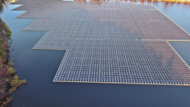 Solar panels float on surface of lake during environmentally friendly generation of electricity