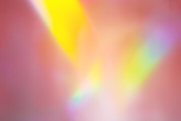 Defocused abstract purple background with rainbow flare from sunlight, holiday backdrop,...