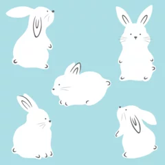 Foto op Aluminium Cute white rabbits in various poses. Rabbit animal icon isolated on blue background. Easter decor © barberry
