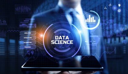 Data science analytics concept. Businessman pressing button on screen.