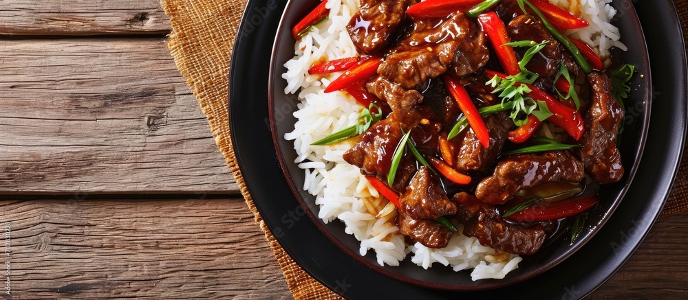 Poster Homemade Chinese Pepper Steak with White Rice. with copy space image. Place for adding text or design