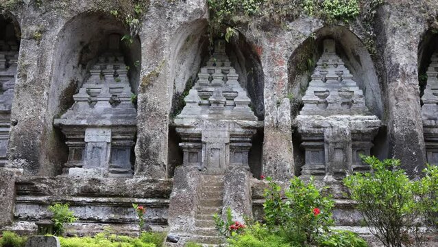 Old Gunung Kawi Temple with rock-cut tombs of kings. Sacred religious place for prayer and worship. Asian culture and religion. Tourist place in Bali for excursions