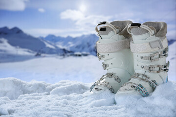 White shoes on snow and frost with empty space for your decoration.  - 702832606