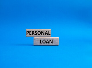 Personal Loan symbol. Concept word Personal Loan on wooden blocks. Beautiful blue background. Business and Personal Loan concept. Copy space