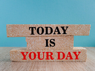 Today is your day symbol. Brick blocks with words today is your day. Beautiful wooden table, blue...
